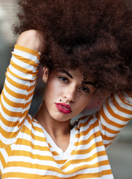 young woman with mole on upper lip